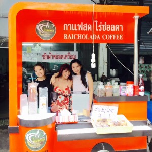 I'M A WORLD TRAVELER - HERE I AM IN A COFFEE STAND IN  BANGKOK, THAILAND WITH MY FRIENDS