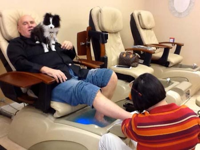 Dennis getting a foot job.jpg